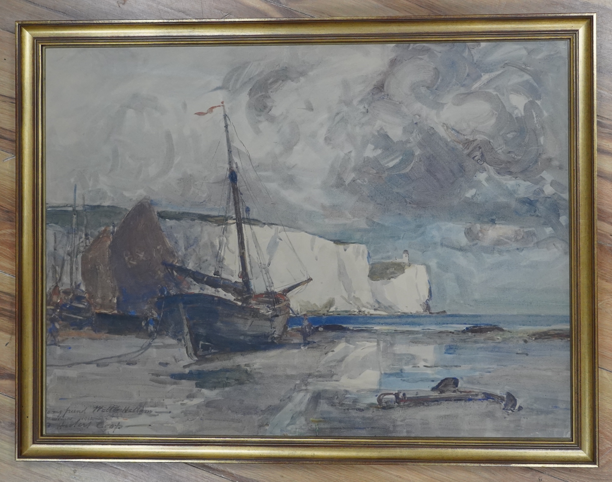 Hubert Coop (1872-1953), watercolour, Coastal view with beached fishing boats, signed, inscribed and dated 1912, 54 x 71cm